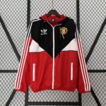 MANCHESTER UNITED CORTAVIENTO CON CAPUCHA 2023/24