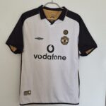 MANCHESTER UNITED 100th ANNIVERSARY REVERSIBLE BLANCO/DORADO RETRO 2001/02 TALLA L