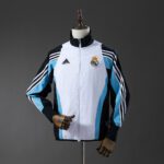 REAL MADRID CORTAVIENTOS BLANCO/CELESTE/NEGRO 2025/26