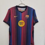 BARCELONA TITULAR PLAYER VERSION 2026/27 ETIQUETA L (CALCE REAL M)